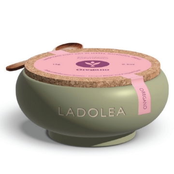 Organic Dried Oregano in a Handmade Ceramic Bowl Dried oregano in a handcrafted ceramic bowl